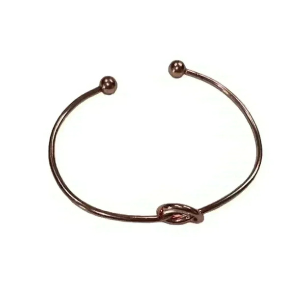 Love knot bangle7 inches around gold tone - Picture 1 of 4